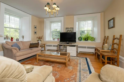 Cozy living room with natural lighting and warm decor