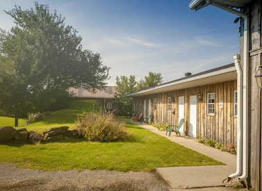 Resident accommodation wings with outdoor seating areas