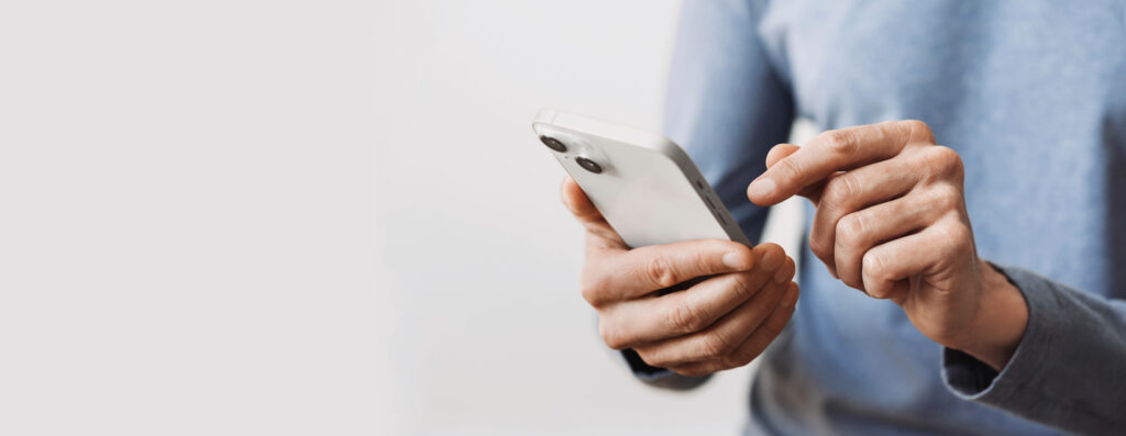 man holding cell phone