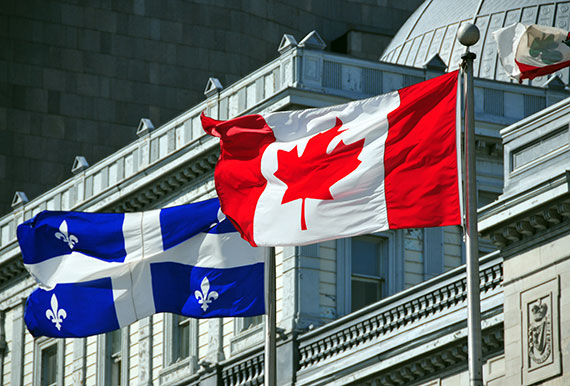 Canadian and Quebec flags side by side, meaning that Canadians stand in solidarity with residents of Quebec who struggle with an addiction to drugs and substances